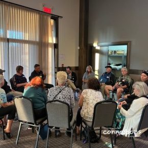 Community participants discussing during the Community Meeting segment of the AGM evening.